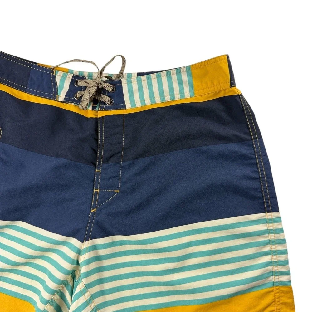 Patagonia Mens 34 Board Shorts Blue Yellow Striped Nylon Mesh Lined Swim Trunks